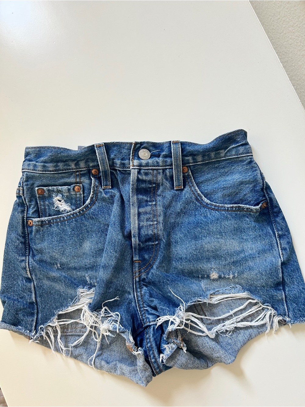 Blue Levi’s Jean shorts- size 25